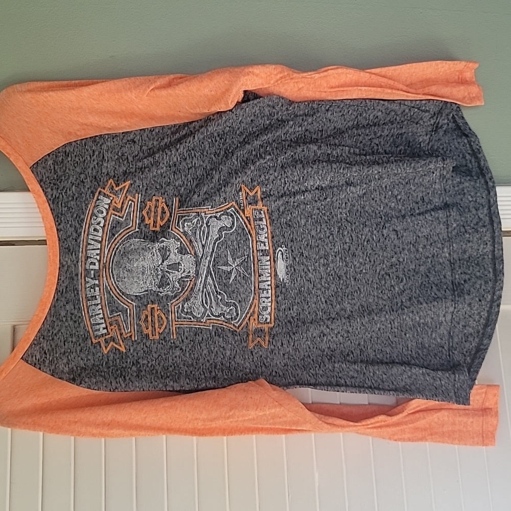 Women's long sleeve but paper thin t-shirt.